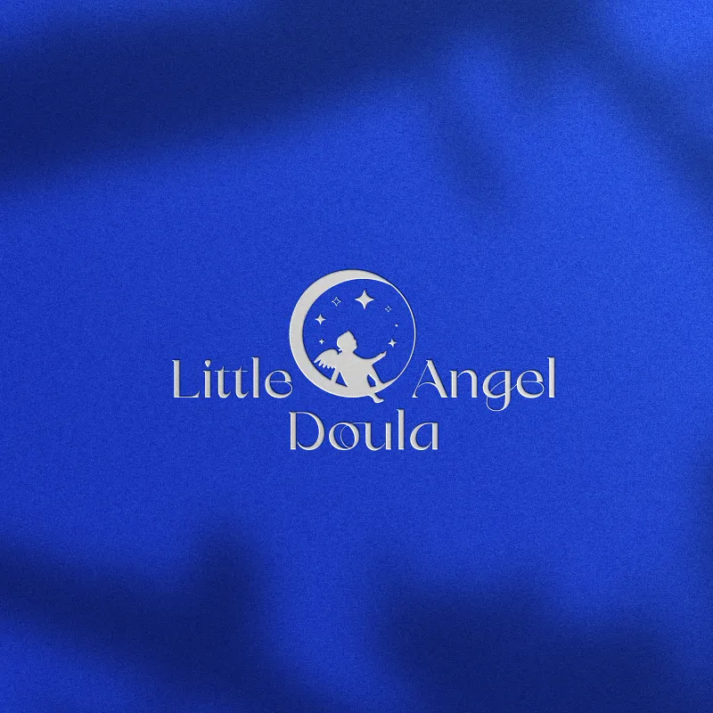 A logo featuring a serene moon and baby silhouette design in white, symbolizing gentle care and support for mothers and newborns. Branding by Dream Wild Studio.