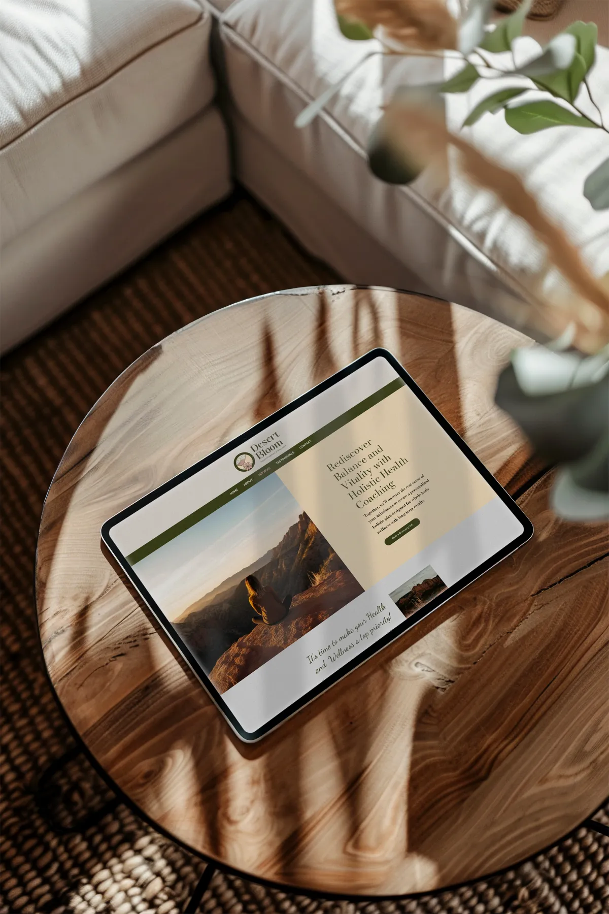 Desert Bloom Website on Tablet Desert Bloom website displayed on an iPad on a table for a holistic wellness company, website design by Dream Wild Studio