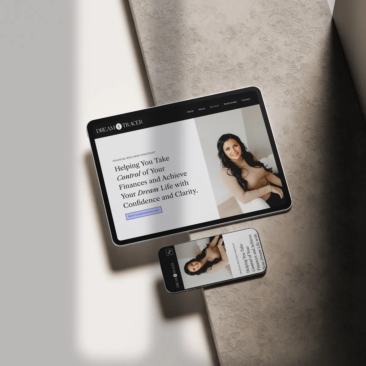 Laptop and phone display the website for a financial strategist. Website design by Dream Wild Studio.