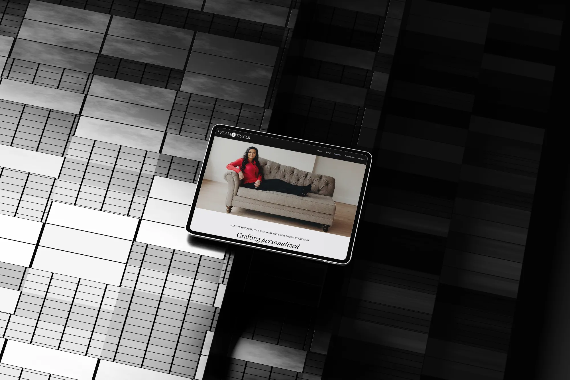 Tablet displaying the Dream Tracer website design in a dark, editorial layout. Designed by Dream Wild Studio.