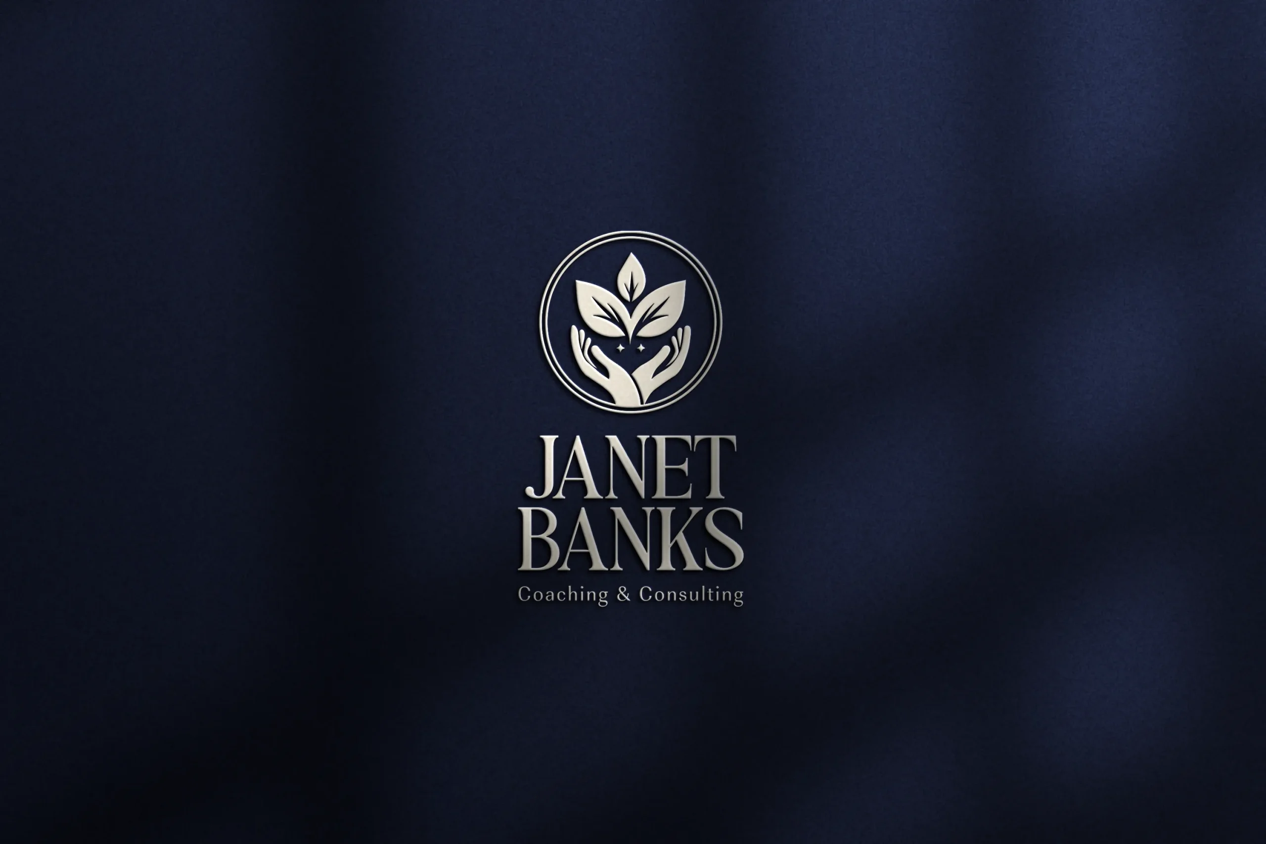 Janet Banks logo on textured blue background, by Dream Wild Studio.