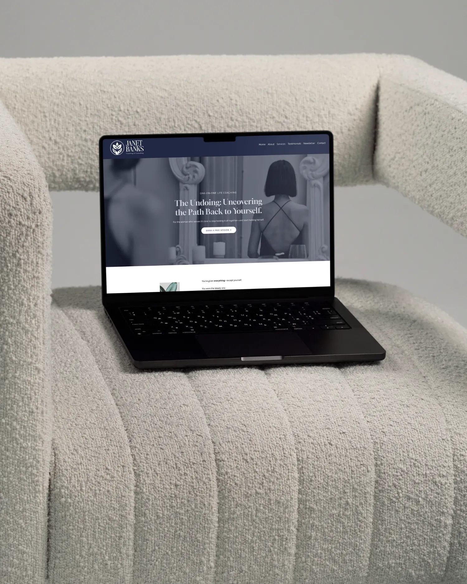 Wellness coaching website for Janet Banks displayed on laptop in calm home setting, by Dream Wild Studio.