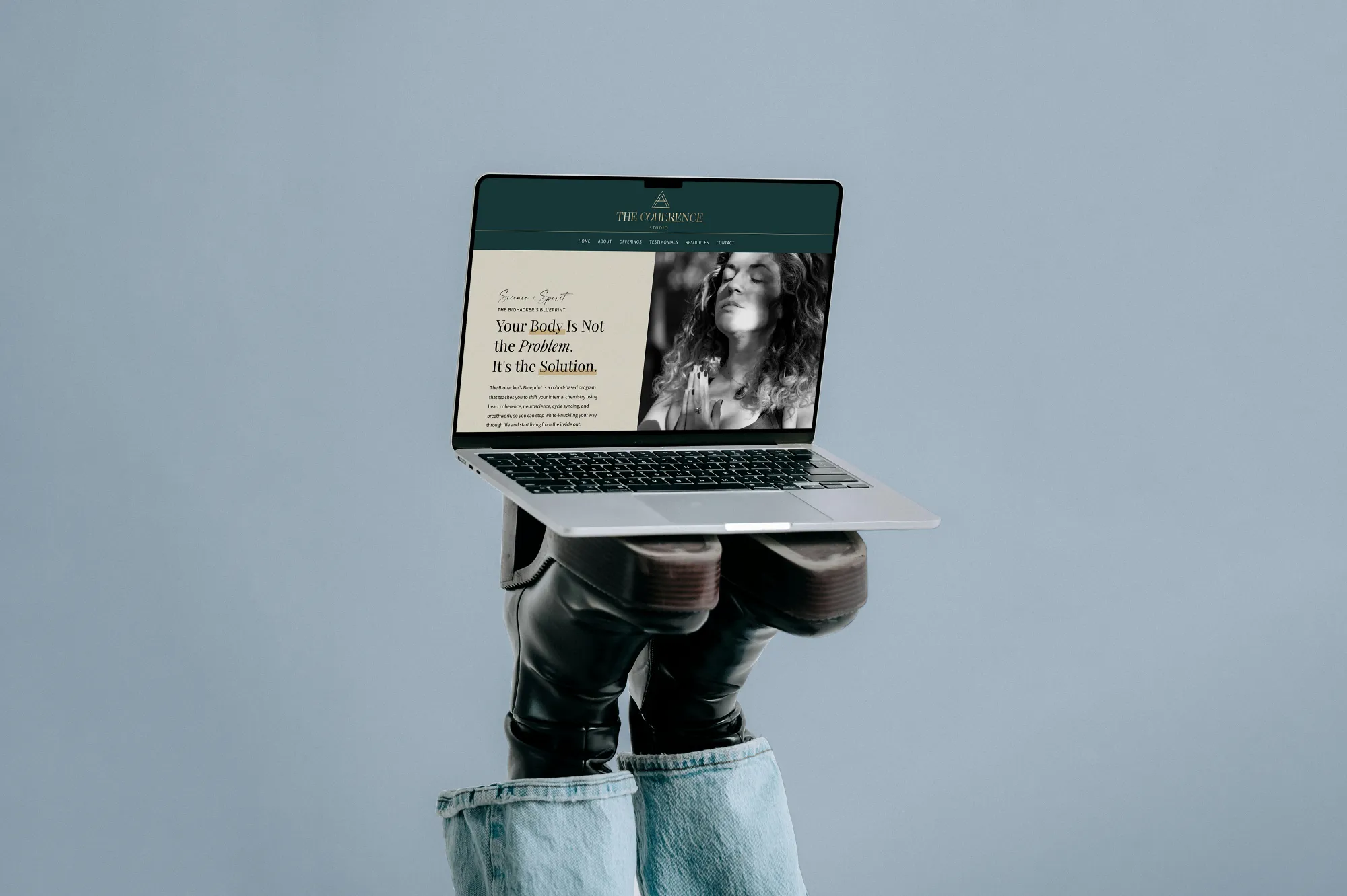 Website design for nurse coach brand The Coherence Studio displayed on laptop, by Dream Wild Studio.