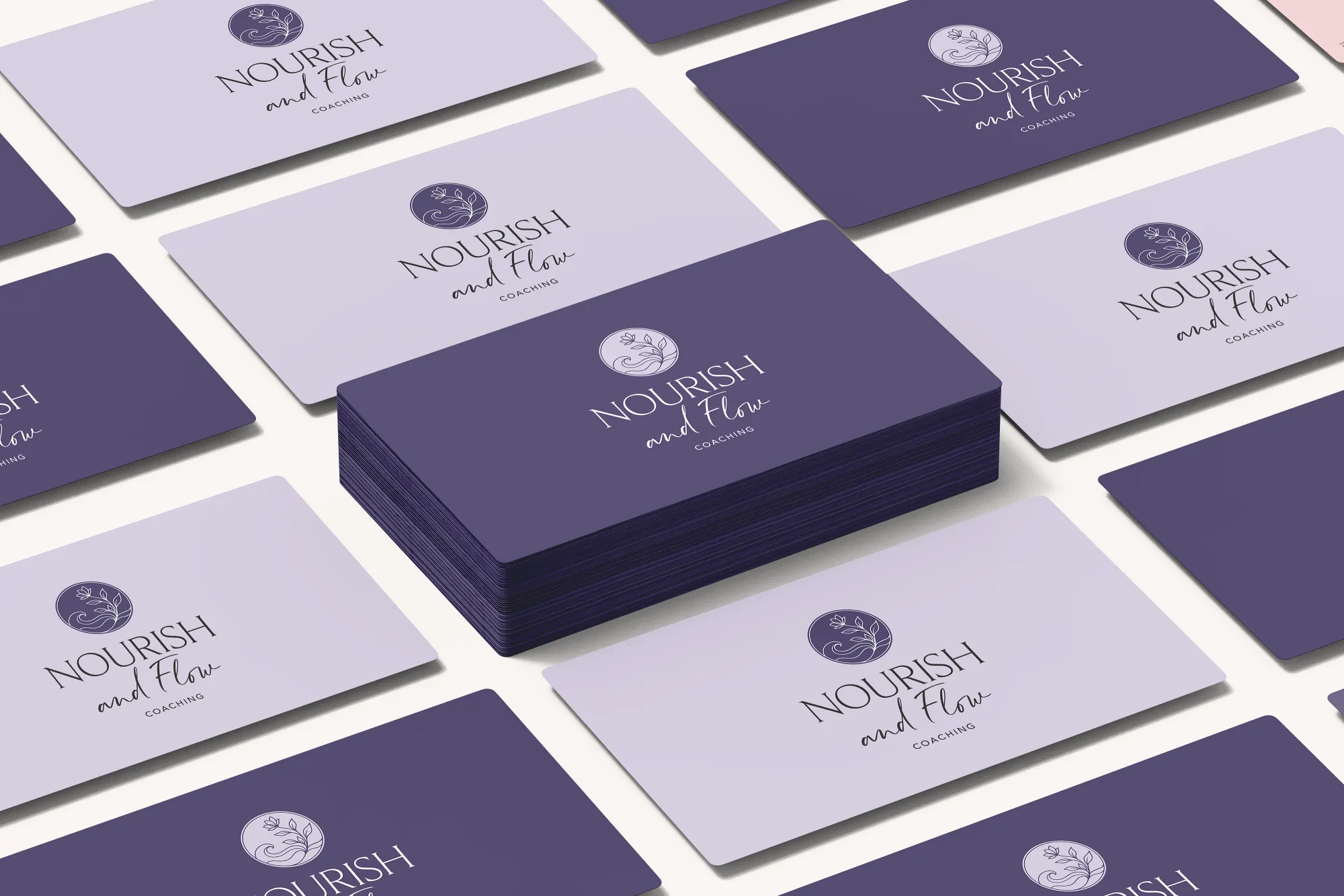 Nourish and Flow Coaching logo design displayed on branded business cards, designed by Dream Wild Studio