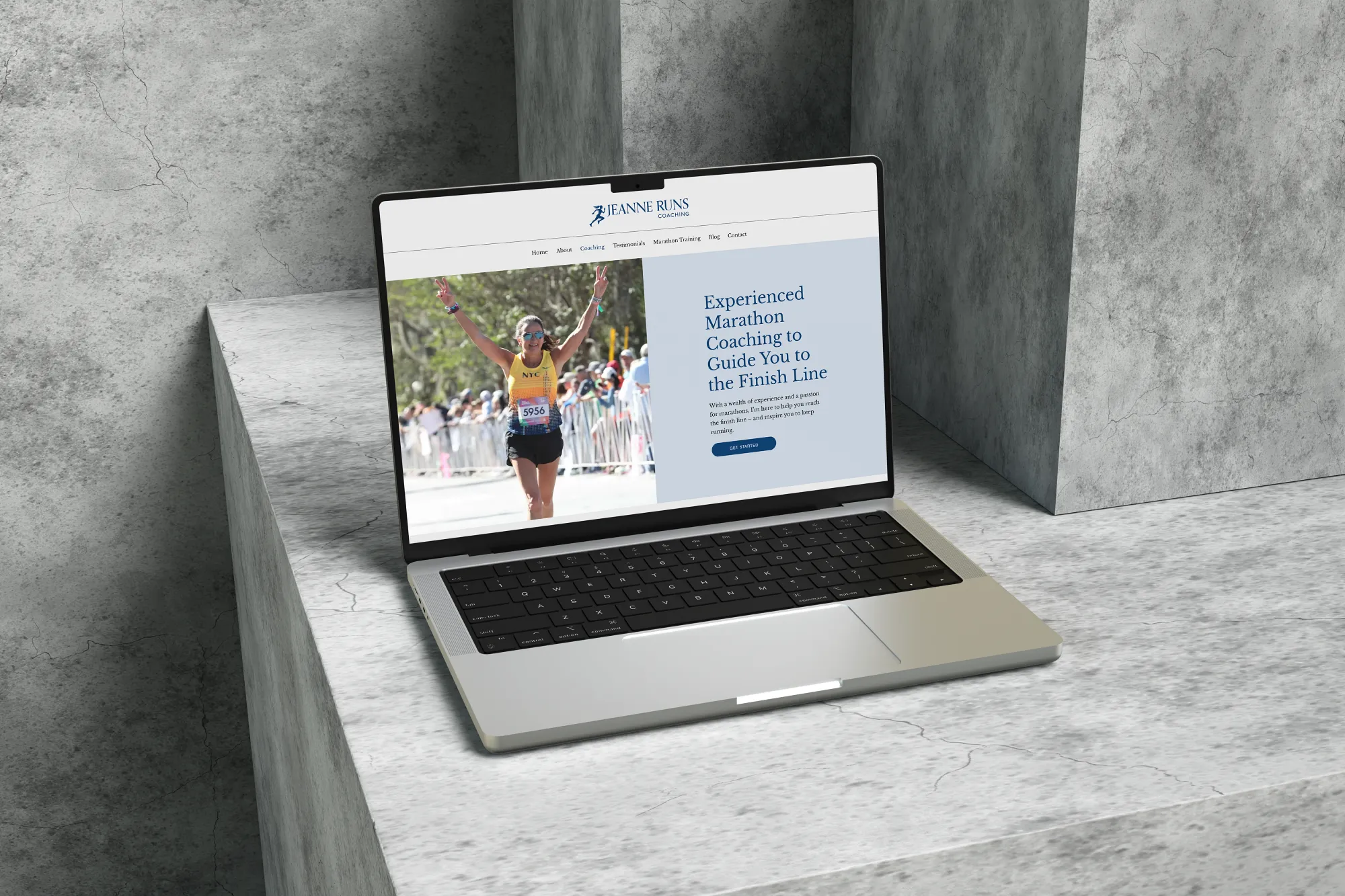 Custom running coach website displayed on a laptop, designed by Dream Wild Studio.