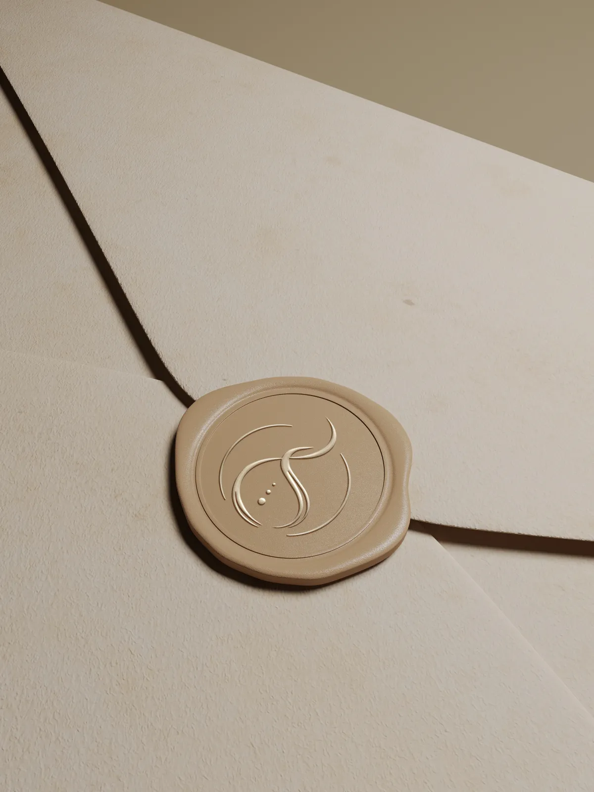 Minimal logo mark engraved on a cream stamp by Dream Wild Studio
