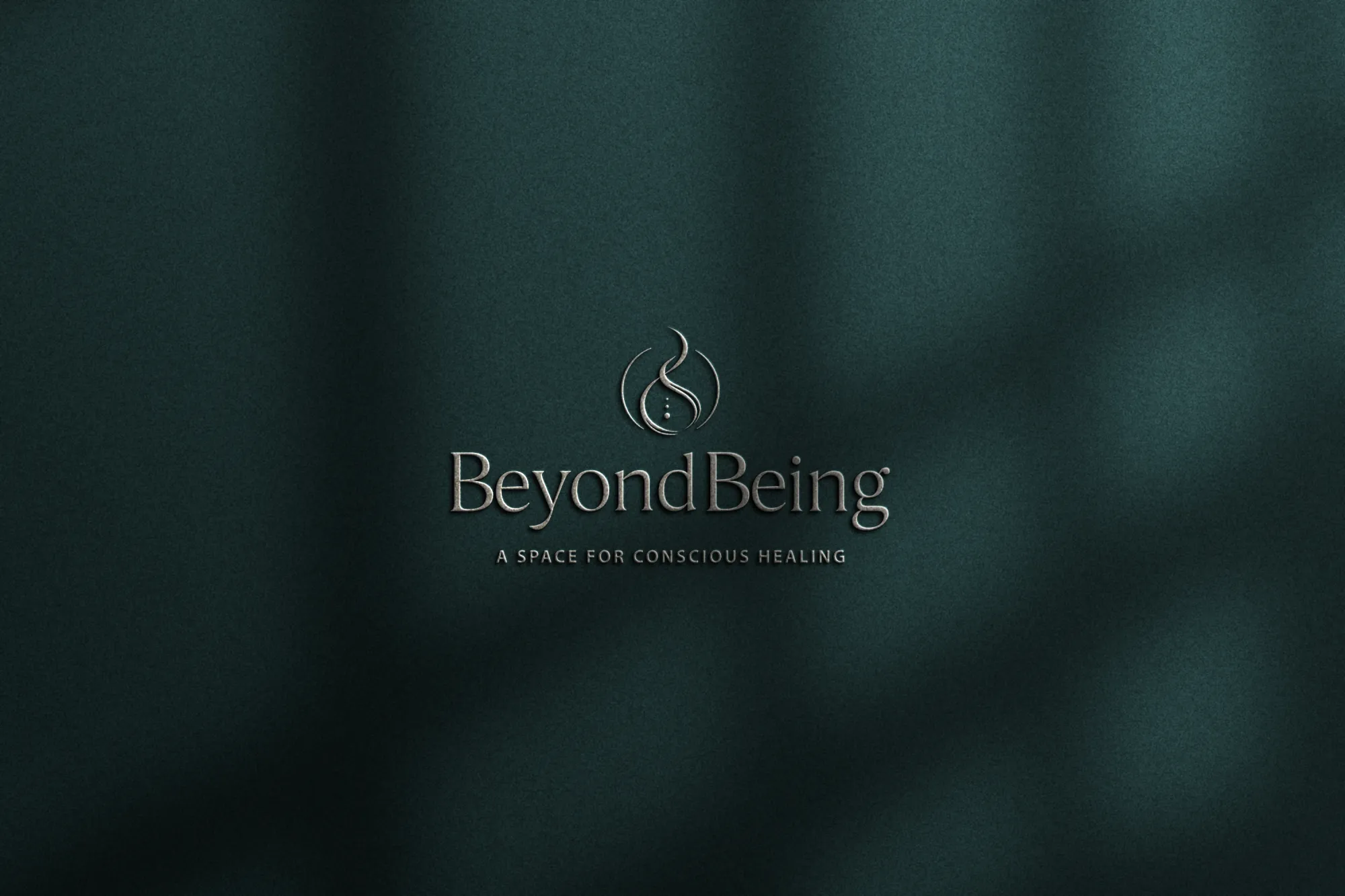 Beyondbeing logo on textured green background, by Dream Wild Studio.